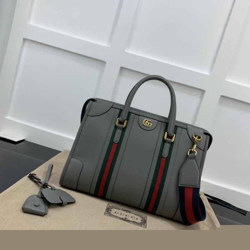 G*u*i shopping bags